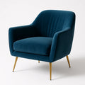 Fauteuil en velours bleu avec pieds en métal doré